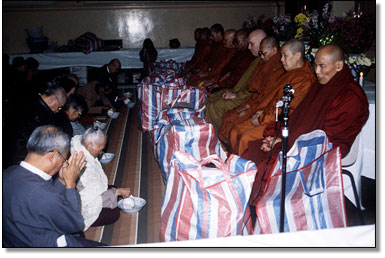 The Sangha accepting Dana 